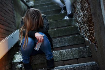 Jonge vrouw op straat / ANP Foto
